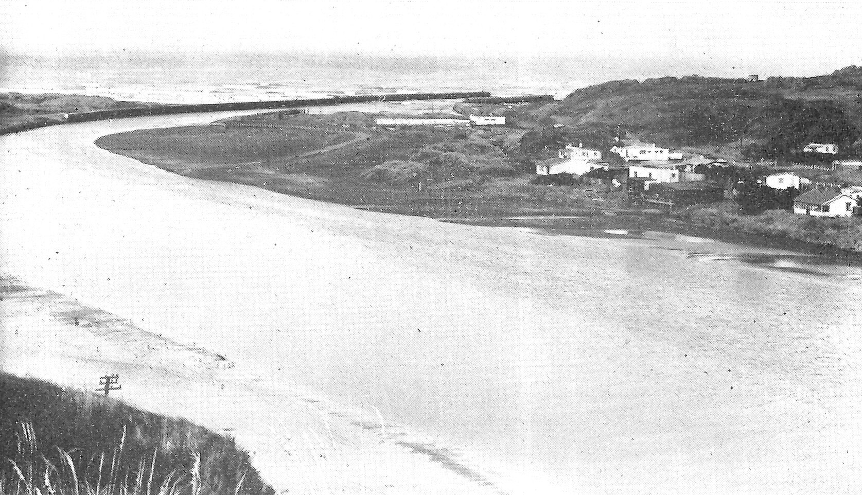 Patea River mouth and beach settlement from the book "Patea Borough Jubilee 1881-1956" by Iris Evelyn Nolan.