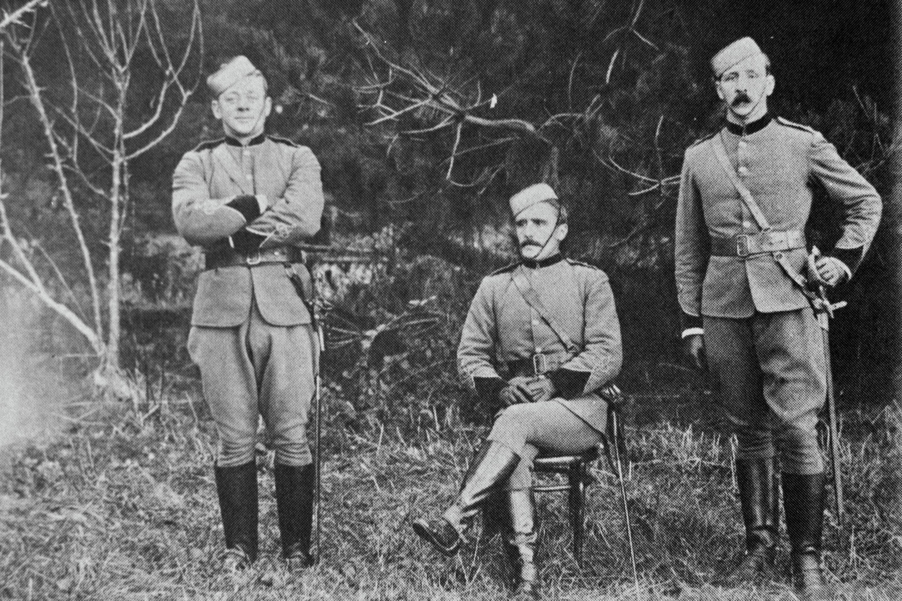 Three members of the Hawera Mounted Rifle Volunteers - Thomas Valintine is on the left (1902). Bernard Woods Studio. Collection of Puke Ariki (WD.039470).