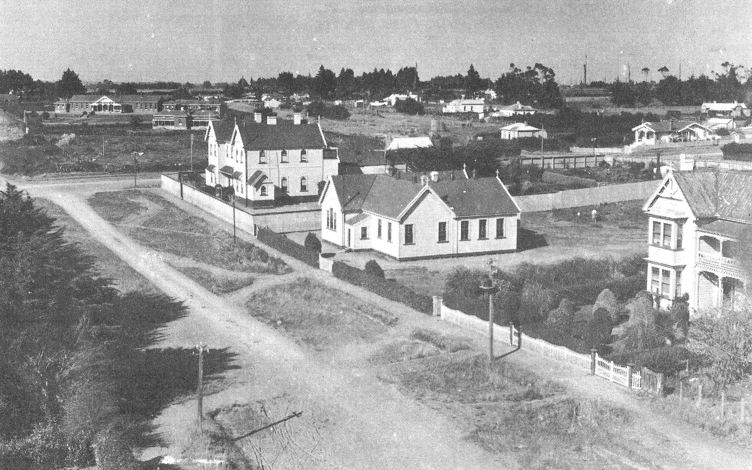 View of the intersection of Miranda Street and Celia Street around 1910 with the hospital in the background and the convent on the corner. From "Stratford: Shakespearean town under the mountain" by David Walter (2005)