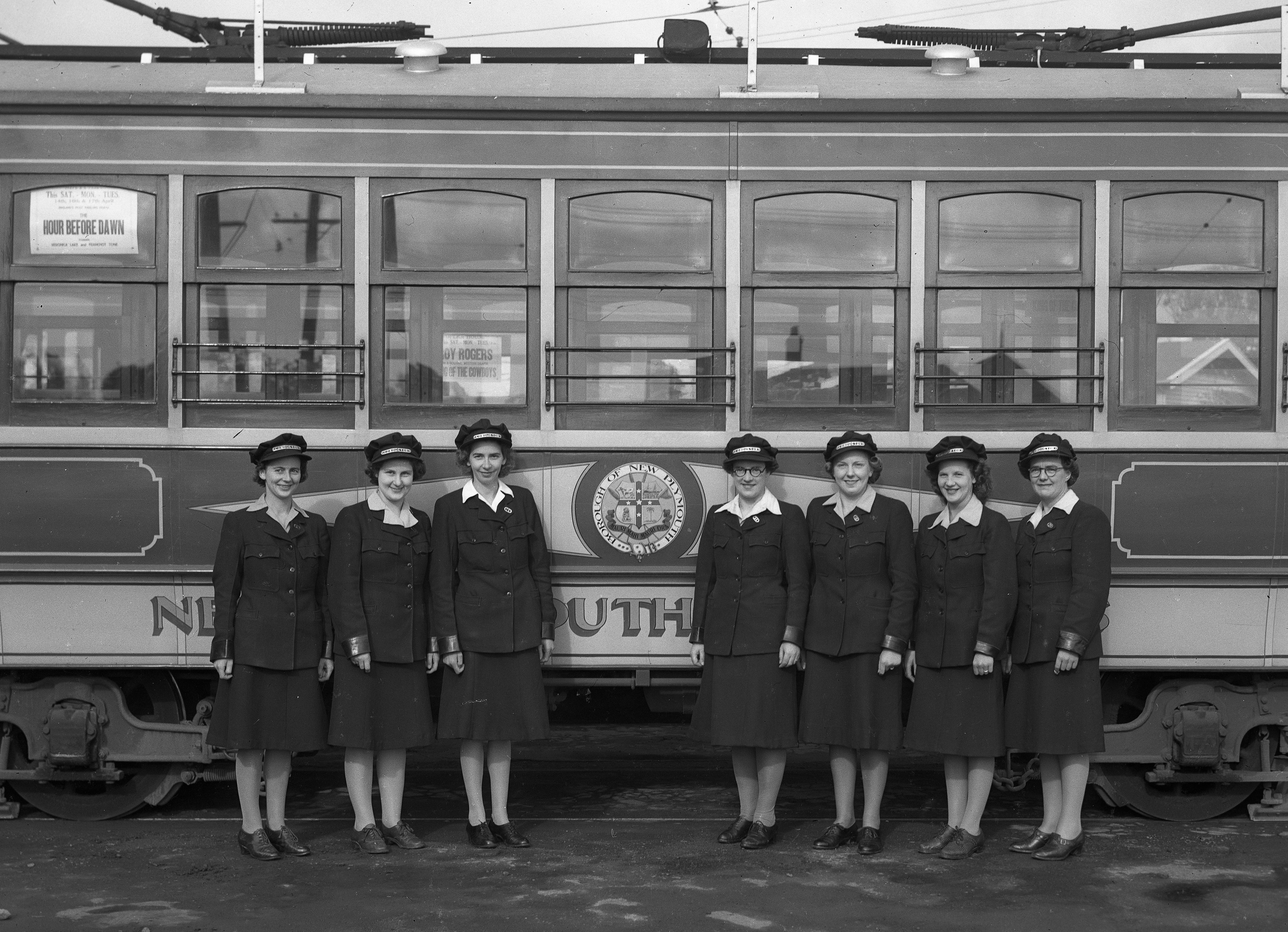 Female tram conductors in New Plymouth - Betty Byers standing second from left (15 April 1945). Swainson's Studios. Collection of Puke Ariki (SW1945.1580).